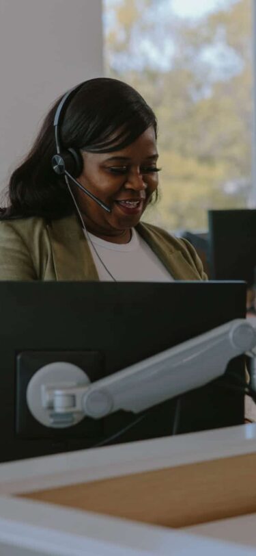 230503-UF-OFFICE-CULTURE-DESKS_177_R2-2 woman talking on phone
